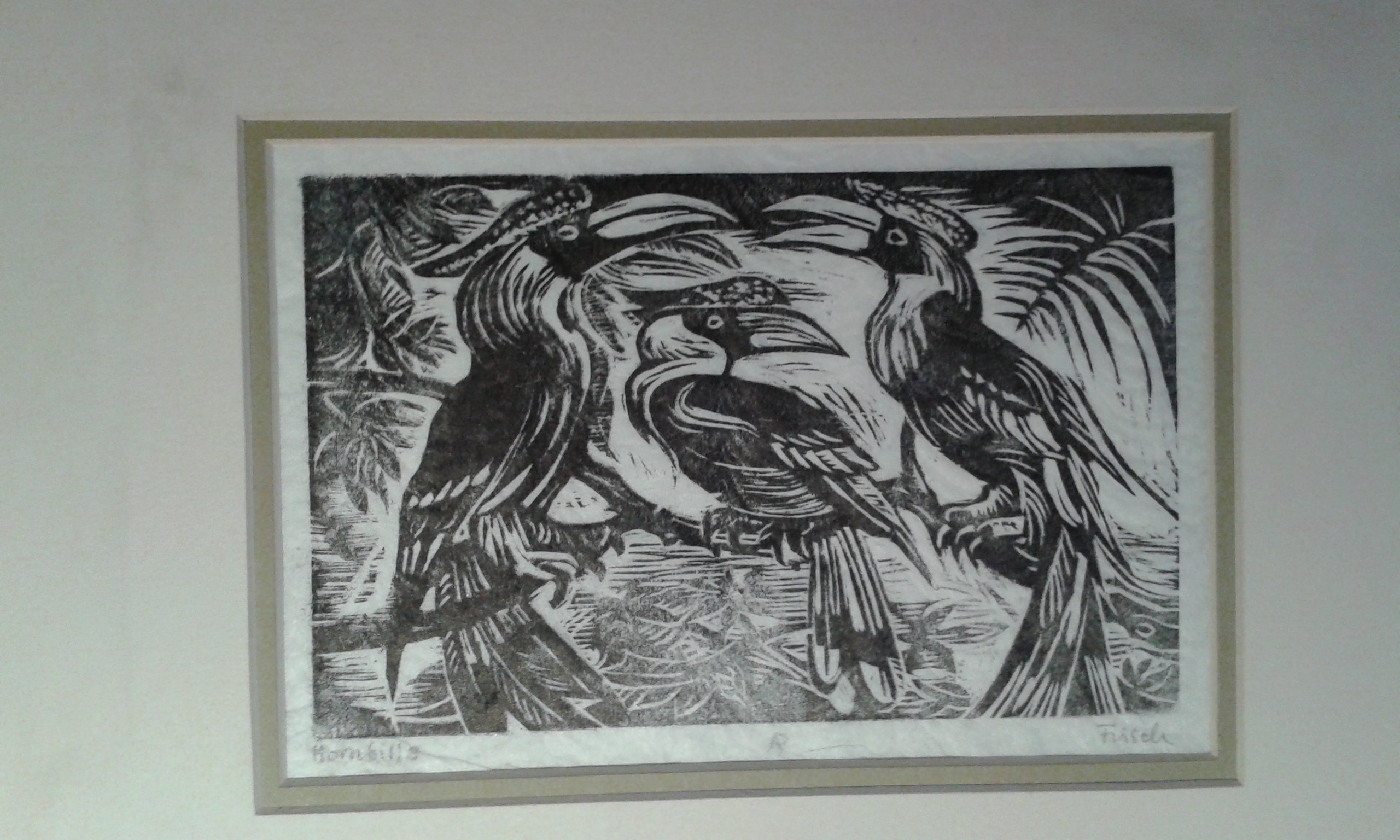 Three hornbills - a woodcut by Ulla Frisch